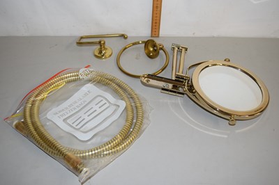 Lot 23 - A brass effect shaving mirror, towel ring and...