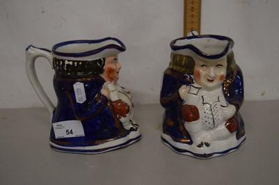 Lot 54 - A pair of Victorian lustre finish Toby jugs