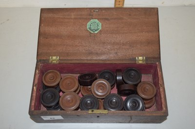 Lot 82 - Box of hardwood draughts