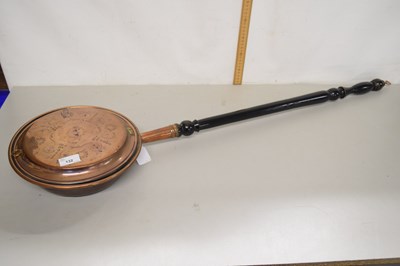 Lot 132 - A copper bed warming pan on turned wooden handle