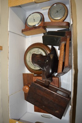 Lot 146 - A box of various barometers, book ends and...