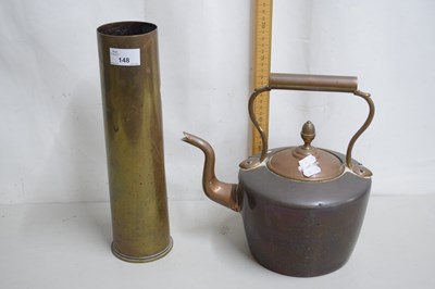 Lot 148 - A copper kettle and a brass shell case