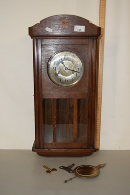 Lot 155 - An early 20th Century oak cased mantel clock