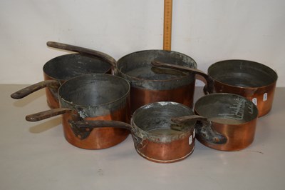 Lot 160 - A group of various copper and iron saucepans