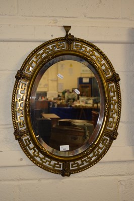 Lot 231 - A Victorian pierced brass framed mirror with...