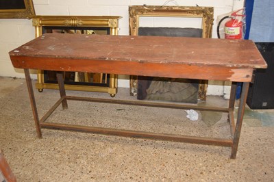 Lot 235 - A wood and iron workshop bench, 181cm wide