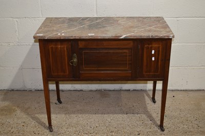 Lot 282 - An Edwardian marble top wash stand