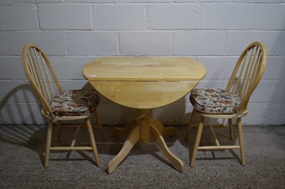 Lot 299 - Modern drop leaf kitchen table and two chairs