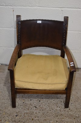 Lot 310 - Early 20th Century oak framed armchair with...