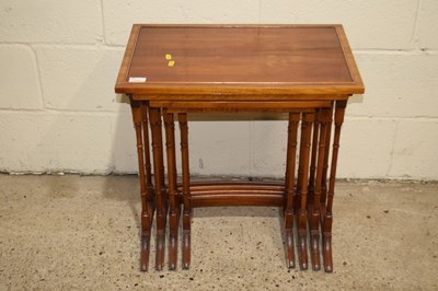 Lot 317 - A nest of four reproduction  tables with yew...