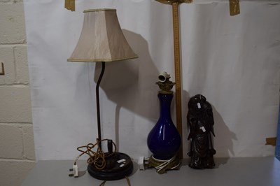 Lot 320 - Table lamp with Chinese root wood carved...