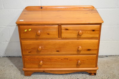 Lot 365 - A stained pine four drawer chest