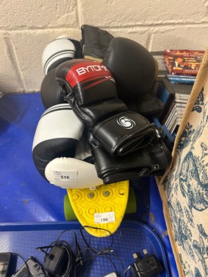 Lot 516 - Three pairs of boxing gloves and a skateboard