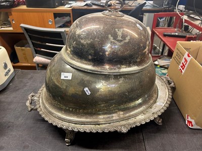 Lot 569 - A silver plated meat stand and cover plus a...