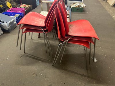 Lot 750 - Set of six Kartell red plastic stacking chairs