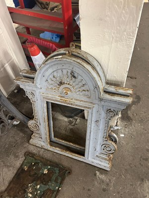 Lot 751 - A pair of small cast iron frames with arched...