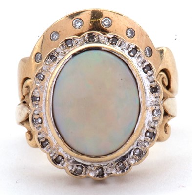 Lot 18 - A 9ct opal and diamond ring and a 9ct diamond...