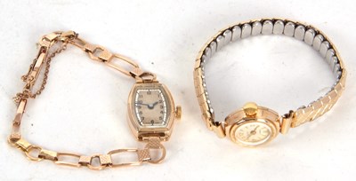 Lot 246 - Two 9ct gold cased lady's wristwatches, both...