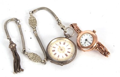 Lot 261 - Mixed Lot: A white metal pocket watch with...