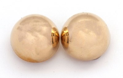 Lot 83 - A pair of 9ct earclips, the round domed...