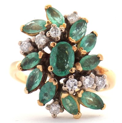 Lot 25 - An 18ct emerald and diamond ring, set with...