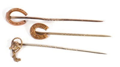 Lot 218 - Three unmarked sporting stick pins: to include...