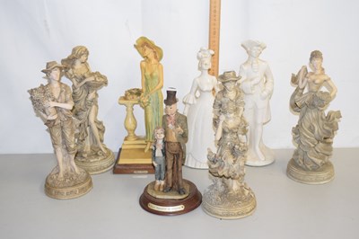 Lot 19 - Further group of figures including a model of...