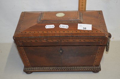 Lot 38 - A Victorian sarcophagus shaped wooden tea caddy