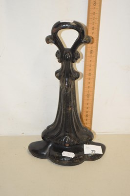 Lot 39 - A black painted cast iron door stop