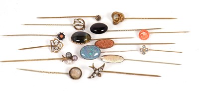 Lot 225 - Fifteen assorted stick pins: to include coral,...