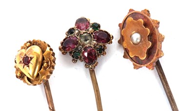 Lot 213 - Three cased stick pins: to include a 15ct red...