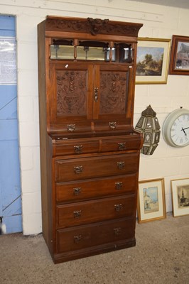 Lot 234 - An early 20th Century dresser with four long...