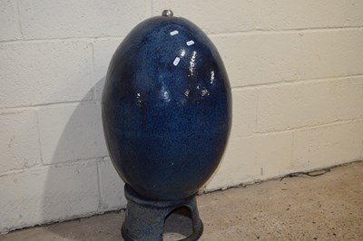 Lot 268 - A blue glazed oval water fountain on stand