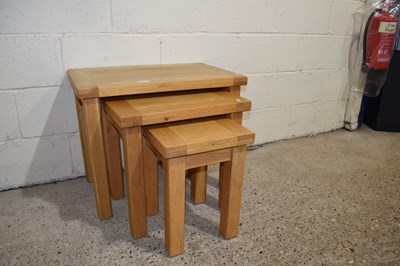 Lot 274 - A set of three pine nesting tables