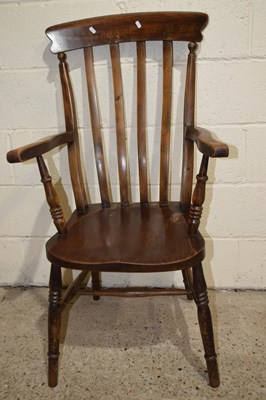 Lot 294 - A stained pine high backed kitchen chair