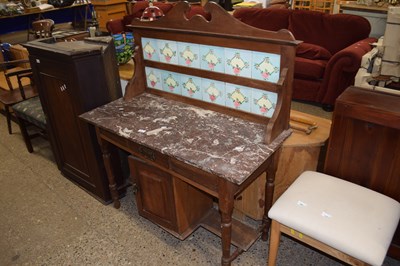 Lot 297 - A early 20th Century marble topped and tile...