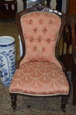 Lot 335 - A pink upholstered button back chair