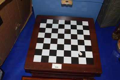 Lot 529 - A games unit to include chess, backgammon and...