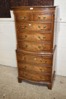 Lot 362 - A reproduction bow fronted chest on chest with...