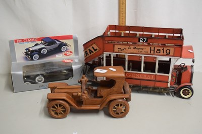 Lot 146 - A wooden car, tin plate bus and a model car,...