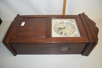 Lot 148 - Oak framed wall clock