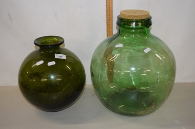 Lot 157 - Two large glass green bottles