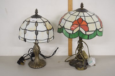 Lot 167 - Two Tiffany style glass shade and metal based...