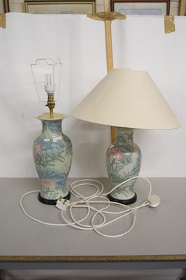 Lot 192 - Two floral decorated table lamps