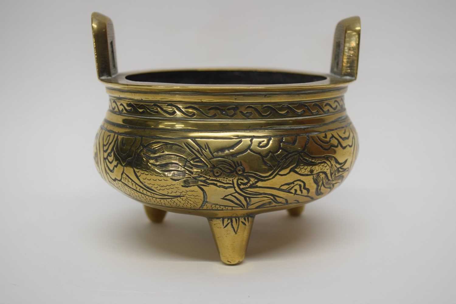 Lot 7 - Small Chinese brass censer on three stub feet,...