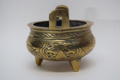 Lot 7 - Small Chinese brass censer on three stub feet,...