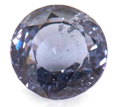 Lot 153 - A violet spinel, approx. 9.8mm diameter x...