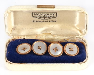 Lot 156 - A pair of mother-of-pearl cufflinks, the round...