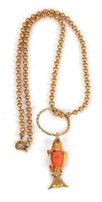 Lot 148 - A coral fish pendant and chain, the fish set...