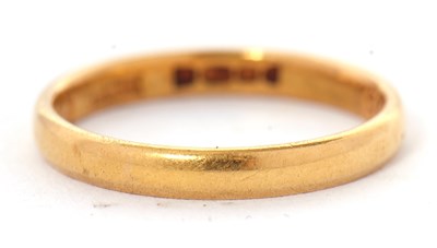 Lot 195 - A 22ct wedding band, hallmarked London 1966,...